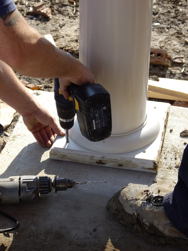 workers installing pillars